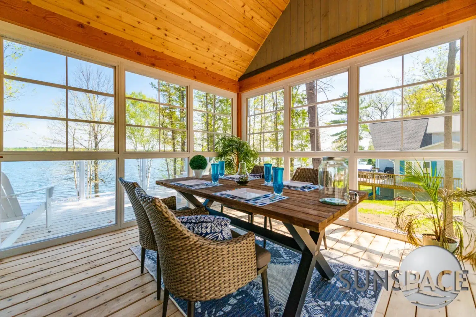 Screened Porch with table and chairs for cozy outdoor dining