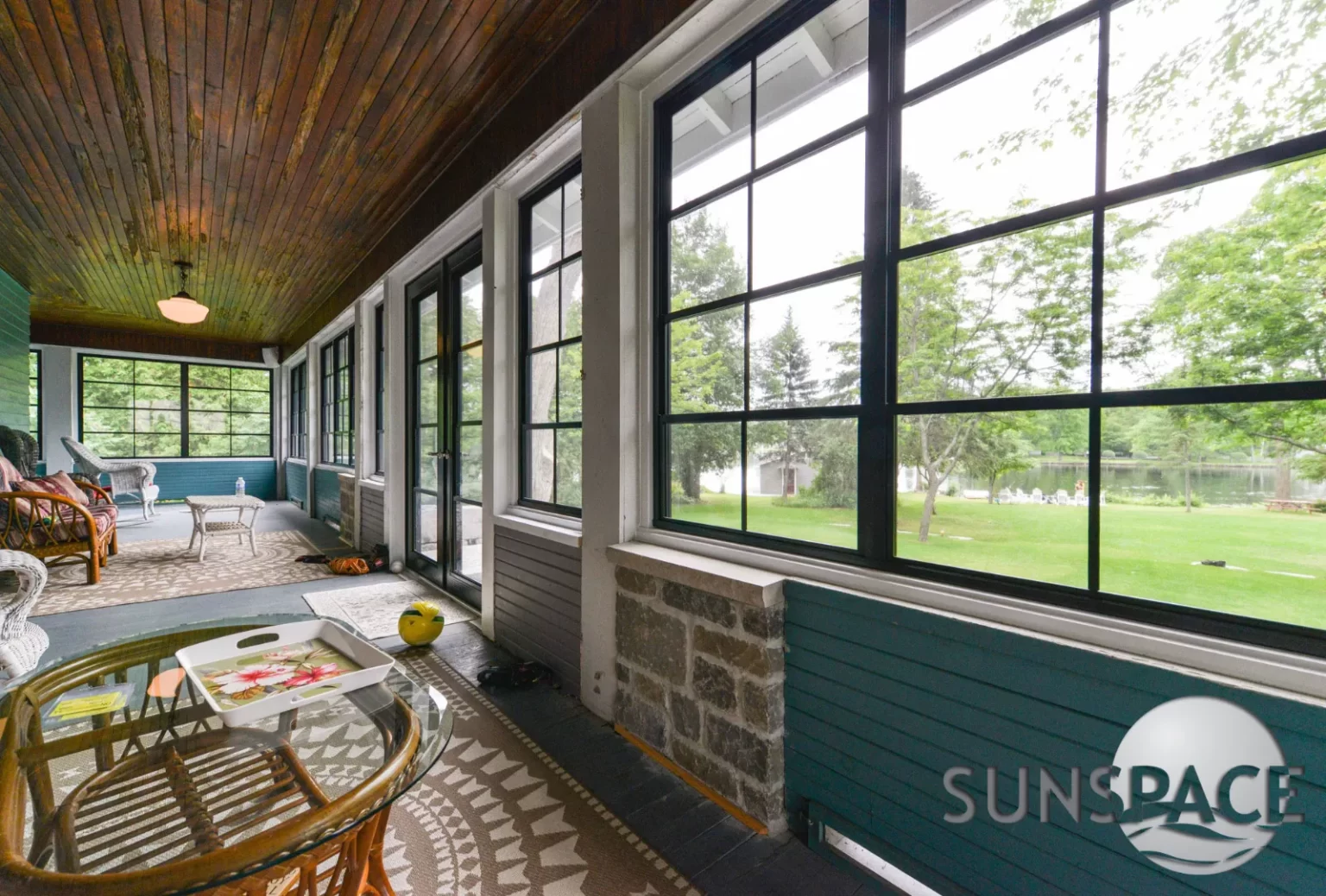 Porch with wicker chairs and WeatherMaster™ Windows