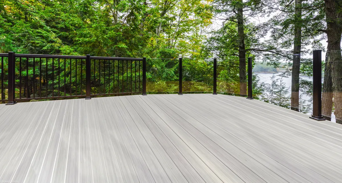 Deck with Aluminum Railing overlooking a calm lake.